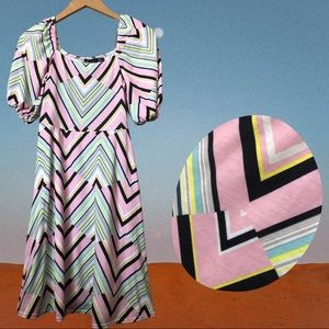 Multi colored baby pink skater dress